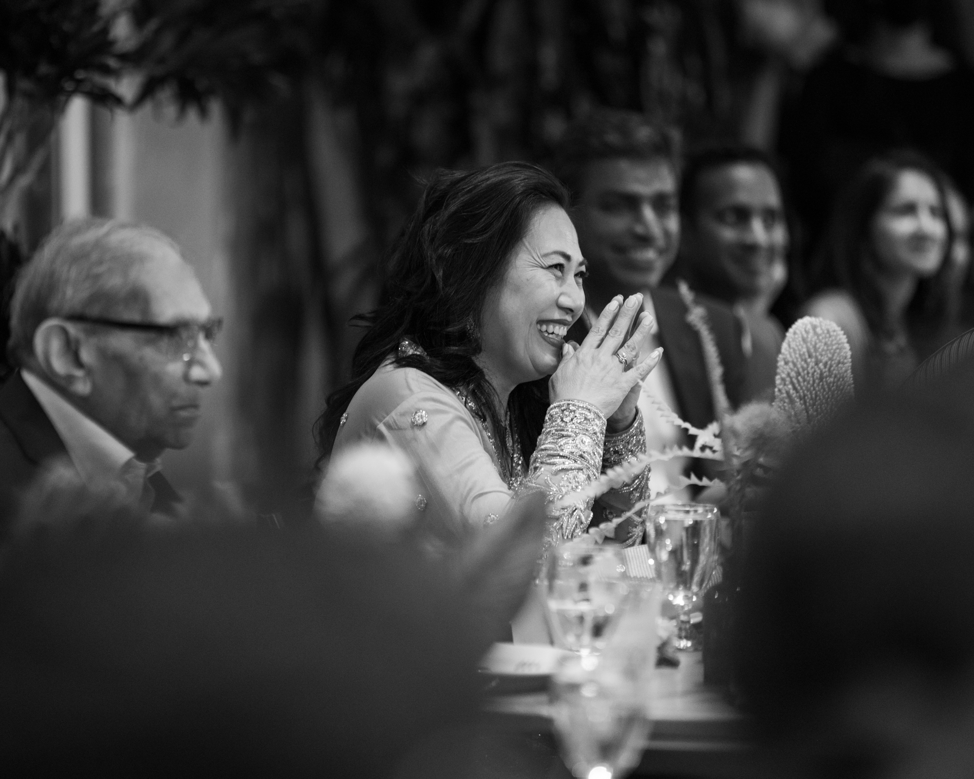 wedding guest laughs during toasts grass room dtla