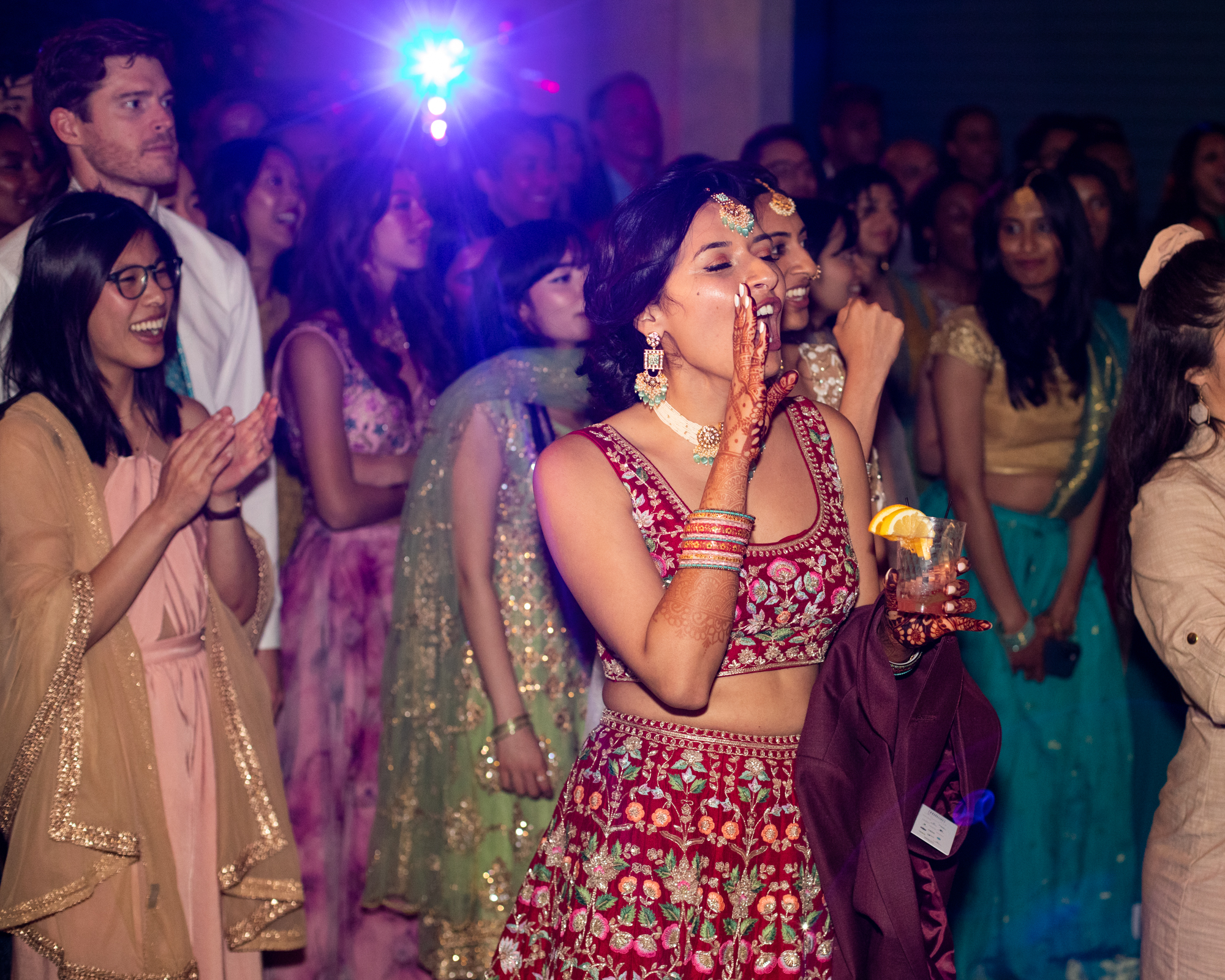 bride cheers during groom dance wedding los angeles
