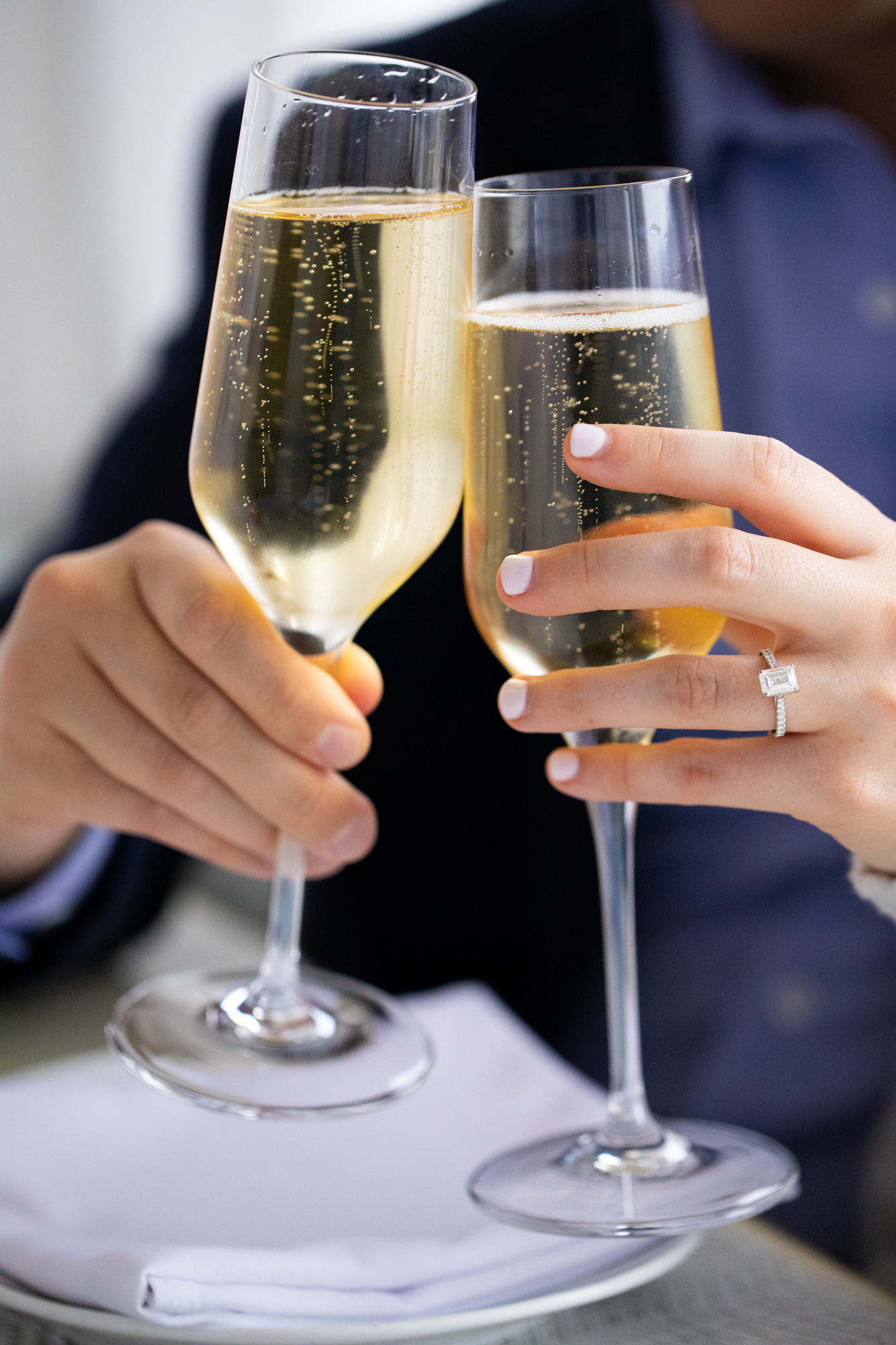champagne toast engaged couple the penthouse the huntley hotel