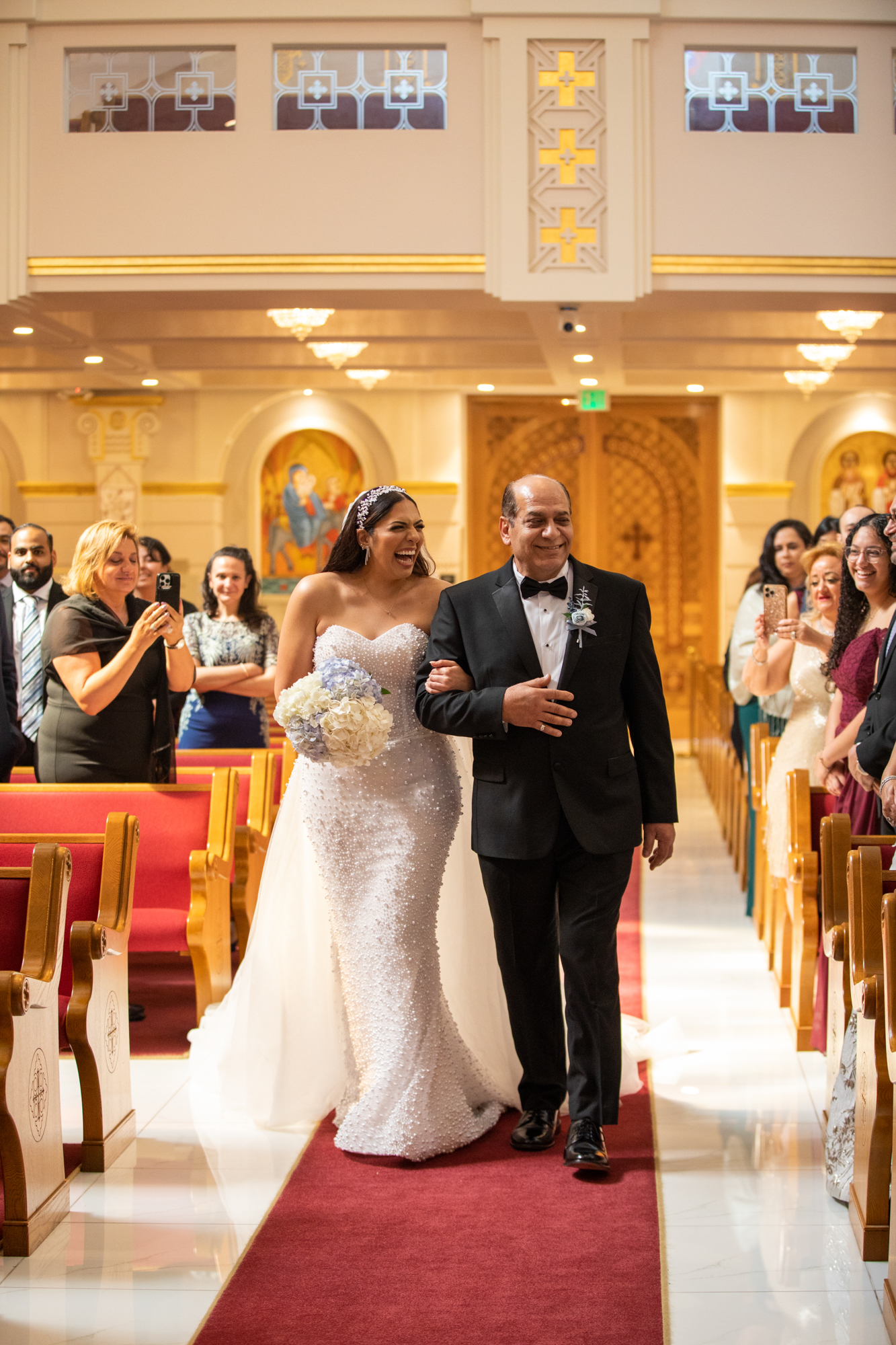 Father walks Egyptian bride down aisle at St. Mercurius and St. Abraam Coptic Orthodox Church