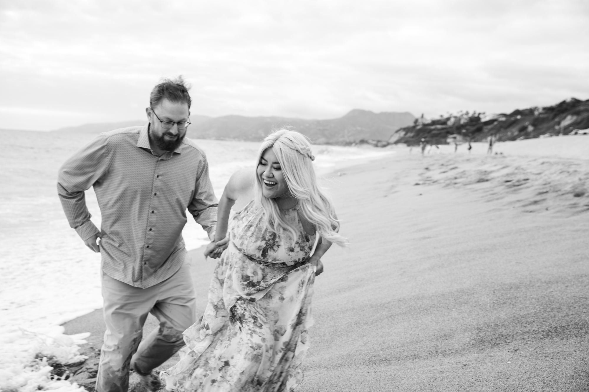 black and white candid photo couple point dume