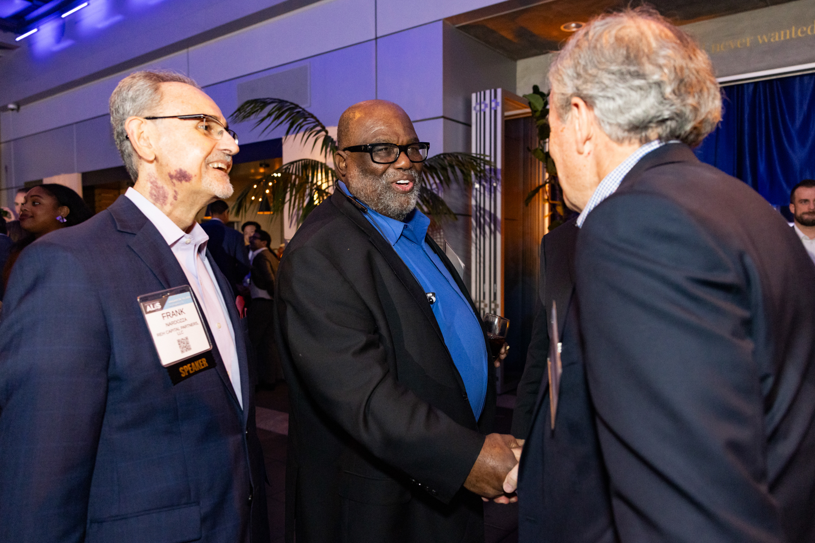 shaking hands grammy museum event photography