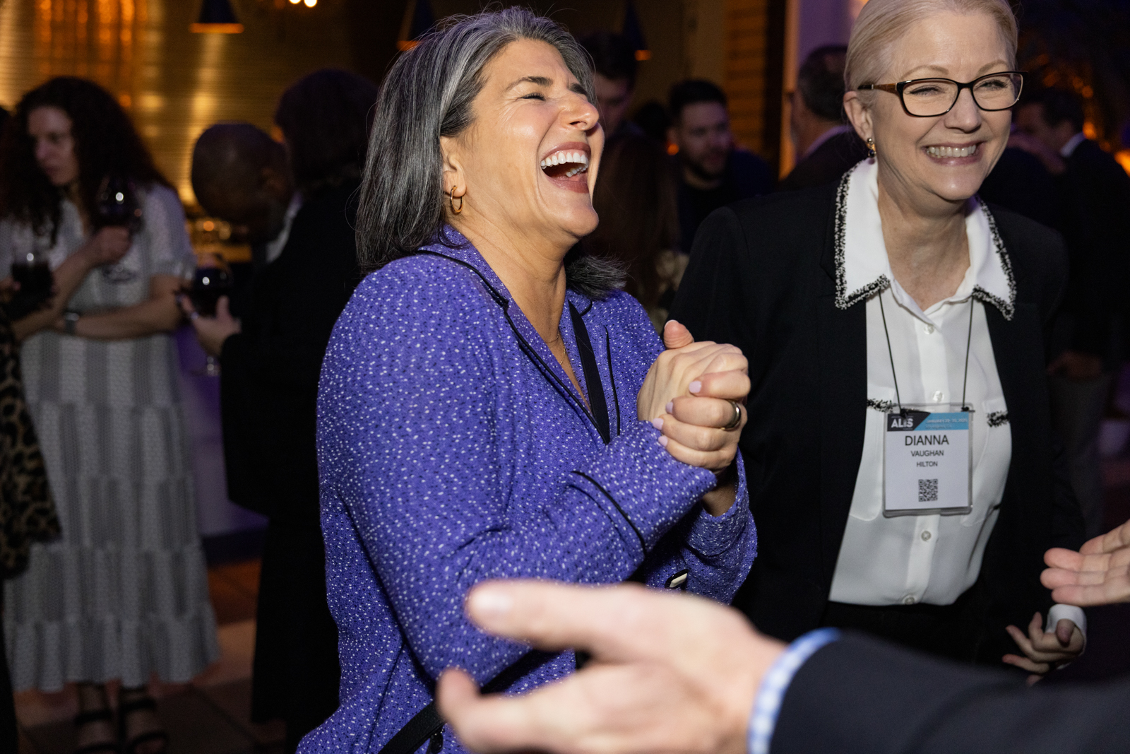 woman laughing networking event los angeles